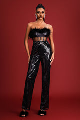 Combinaison à plumes et sequins