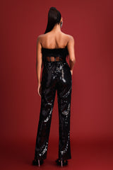 Combinaison à plumes et sequins