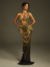 Robe longue bustier dorée à découpes et cristaux