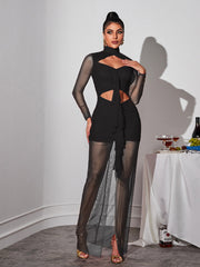 Robe longue noire à manches longues et découpes en résille