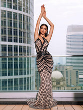 Robe maxi asymétrique à sequins et cordonnet