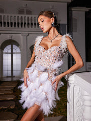 Robe à sequins en perles et plumes
