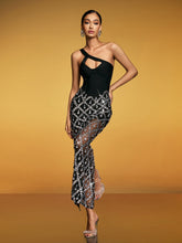 Robe longue fendue à paillettes et cristaux