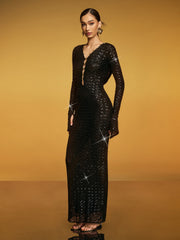 Robe longue à sequins et découpes à capuche