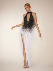 Robe longue fendue à franges et dos nu, noire et blanche