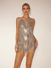 Robe courte dos nu en cotte de mailles