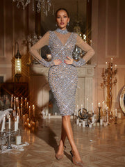 Robe midi en résille strass à manches longues