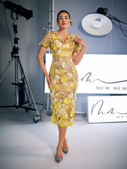 Robe midi jaune brodée de fleurs