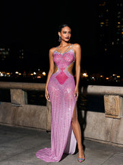 Robe longue rose fuchsia à découpes en cristal