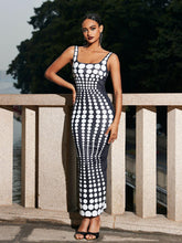 Robe longue blanche à pois