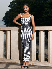 Robe longue blanche à pois