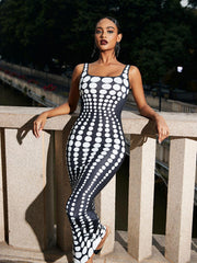 Robe longue blanche à pois