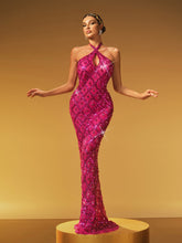 Robe longue dos nu à sequins et cristaux rose fuchsia
