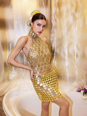 Haut à paillettes et cristaux dorés