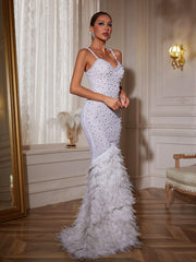 Robe longue sirène à spaghetti et plumes