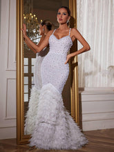 Robe longue sirène à spaghetti et plumes