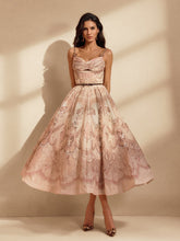 Robe midi imprimée à fines bretelles
