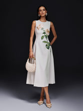 Robe midi blanche sans manches brodée de fleurs