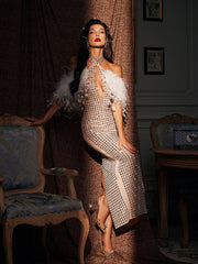 Robe longue dos nu à strass et plumes