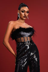 Combinaison à plumes et sequins 