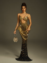 Robe longue bustier dorée à découpes et cristaux 