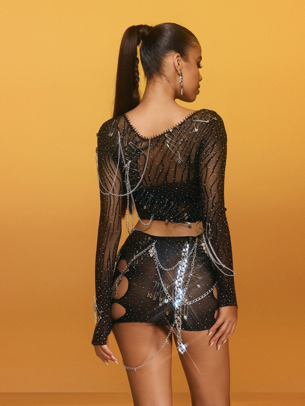 Ensemble jupe à découpes et strass 