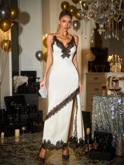 Robe longue fendue en dentelle spaghetti blanche 
