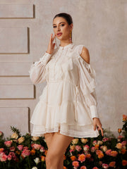 Robe mini à manches longues et découpes à volants 