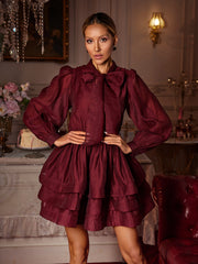 Robe mini à manches longues et à volants et nœud 