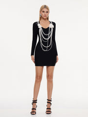Robe mini bandage à col V et chaîne de perles 