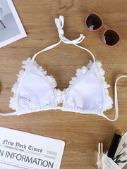 French-style romantic white floral bikini, pure and alluring, flattering and photogenic.
