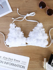 French-style romantic white floral bikini, pure and alluring, flattering and photogenic.