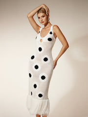 Robe midi blanche en maille à pois et franges 