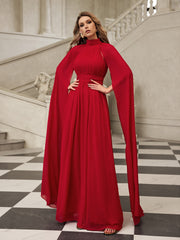 Robe longue en maille à manches cape 
