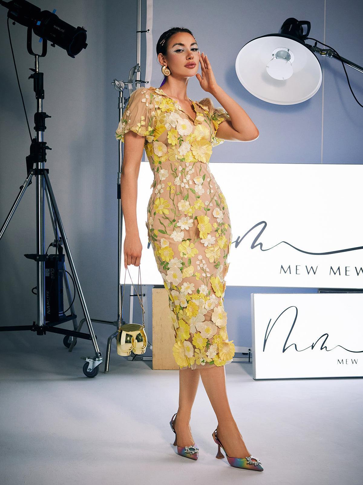 Robe midi jaune brodée de fleurs 