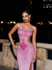 Robe longue rose fuchsia à découpes en cristal 