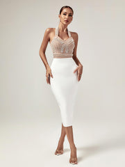 Robe bandage beige à perles et col halter