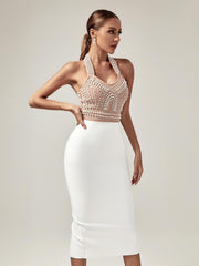 Robe bandage beige à perles et col halter