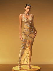 Robe longue fendue en résille et cristaux 