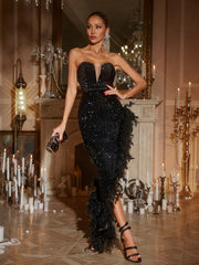 Robe longue bustier noire à sequins et plumes