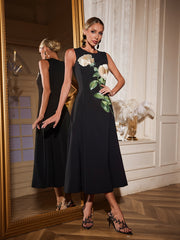Robe midi sans manches noire brodée de fleurs 