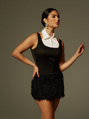 Robe mini sans manches bordée de fourrure 
