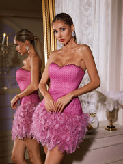 Robe mini bustier à strass et plumes 