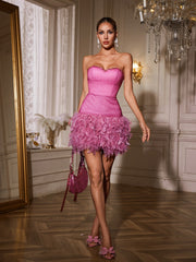 Robe mini bustier à strass et plumes 